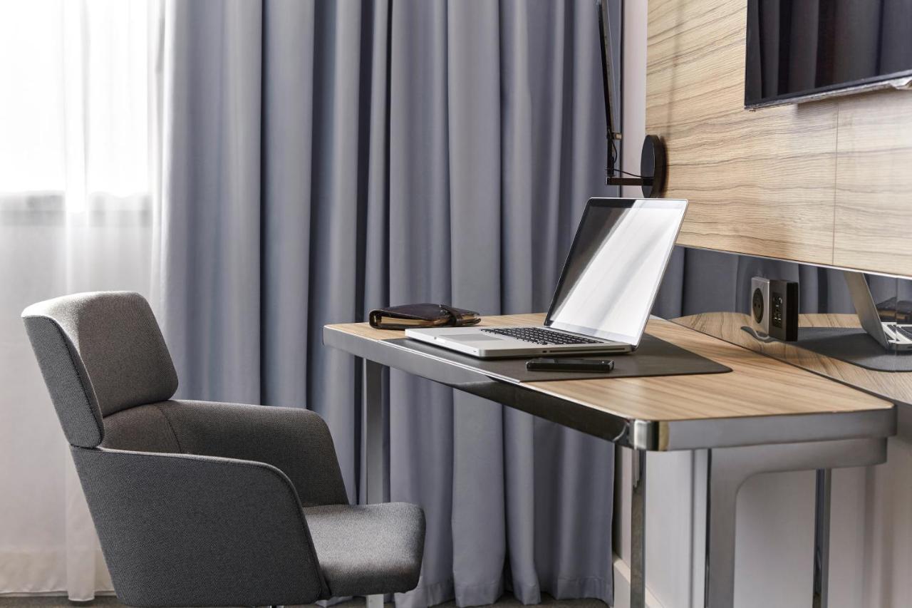 Отель Novotel Expo Centre 4*