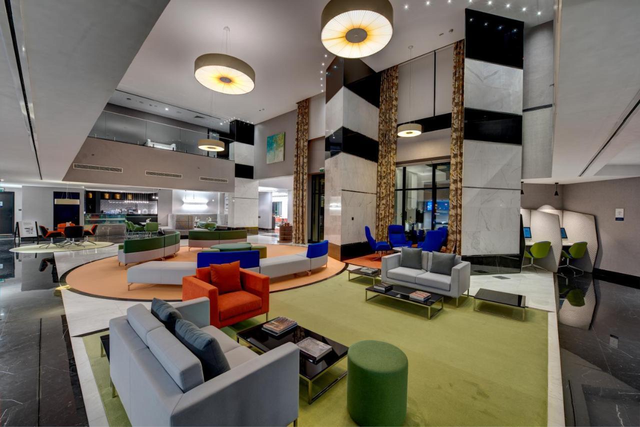 Отель Novotel Expo Centre 4*